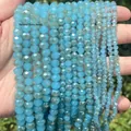 Macro view of faceted lake blue crystal glass beads for DIY jewelry making accessories. - 4x3mm (Approx 112 Beads) / Faceted Crystal Lake Blue Half Amber