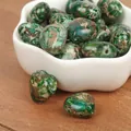 Close-up of heart-shaped multi-color imperial turquoise beads with horizontal holes. - Horizontal Hole Heart Shape / 2 Pieces/Pack (15mm) / Dark Green