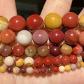 Close-up detail of earthy-toned natural stone round beads for diy jewelry making projects. - 6mm (Approx 58 Pieces/Pack) / Yellow Jasper