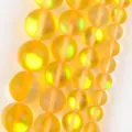 High-quality macro view of translucent yellow round aura stone beads for DIY jewelry. - 6mm (Approx 58 Pieces/Pack) / Frosted Yellow Flash Stone