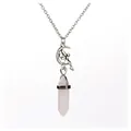 Detail of a silver necklace featuring a moon fairy pendant with a rose quartz crystal point. - Rose Quartz