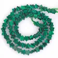 Detail view of 6mm star-shaped natural green malachite loose beads for DIY jewelry - 1 Strand Approx 68 Pcs (6x2mm) / Green Peacock