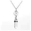Close-up of silver yoga pose pendant with clear white crystal hexagonal point charm. - Yoga / White Crystal