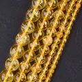 Macro detail of yellow natural stone beads with various sizes for jewelry making - 6mm (Approx 58 Pieces/Pack) / Citrine