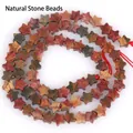 Macro detail of 6mm star-shaped natural stone beads with red cord for DIY jewelry making - 1 Strand Approx 68 Pcs (6x2mm) / Picasso Stone