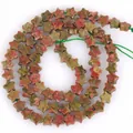 Detailed view of 6mm star-shaped unakite natural stone beads for DIY jewelry - 1 Strand Approx 68 Pcs (6x2mm) / Unakite