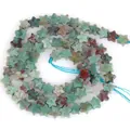 Close-up of 6mm star-shaped green aventurine natural stone beads for DIY jewelry - 1 Strand Approx 68 Pcs (6x2mm) / Chrysocolla