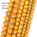 Macro view of yellow natural stone beads with golden crackle pattern for jewelry making - 8mm (Approx 44 Pieces/Pack) / Golden Line Yellow Turquoise