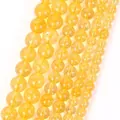 Macro detail of yellow natural stone round beads showcasing natural internal textures - 6mm (Approx. 58 Pieces) / Yellow Crackle Crystal