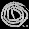 Macro detail of 3x3mm white natural stone cube spacer beads for DIY jewelry making - White Jade