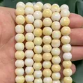 Round porcelain finish glass beads in creamy yellow and white for DIY jewelry crafts - 8mm / Amber Yellow