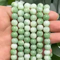 Green and white marbled round glass beads for DIY bracelet and jewelry making projects. - 8mm / Green/White