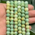 Light green and yellow painted glass round beads with cracked texture for DIY jewelry - 8mm / Green and Light Yellow