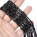 Close-up of 4mm faceted black natural stone round disc beads for jewelry making - 1 Strand Approx 98 Beads (4mm) / Black Spinel