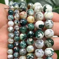 Close-up of green and white dragon vein fire agate beads showing natural textures - 6mm / Dark Green Tiger Skin Dragon Vein Fire Agate
