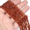 Detailed view of 4mm faceted natural stone rondelle beads for DIY jewelry making - 1 Strand Approx 98 Beads (4mm) / Orange Pomegranate