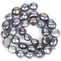 Close-up view of 10-11mm black iridescent baroque pearls with glossy finish for DIY jewelry. - 3A Grade Baroque Pearl / 10-11mm, Approx 32cm Per Strand / Rainbow Black
