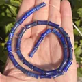 Detailed view of 5x12mm blue lapis lazuli bamboo-shaped tube beads for DIY jewelry - One Strand Approx 31 Pieces (5x12mm) / Lapis Lazuli
