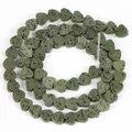 Close-up of heart-shaped green volcanic lava stone beads with porous texture for DIY jewelry - 6x7mm (Approx 60-62 Beads) / Army Green