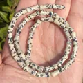 Detailed view of 5x12mm natural Dalmatian jasper bamboo shaped beads for DIY jewelry making - One Strand Approx 31 Pieces (5x12mm) / Dalmatian Jasper