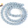 Detail view of heart-shaped blue volcanic stone beads for DIY jewelry crafting projects - 6x7mm (Approx 60-62 Beads) / Light Blue