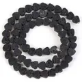 Close-up of heart-shaped natural black lava stone beads for DIY jewelry making. - 6x7mm (Approx 60-62 Beads) / Black
