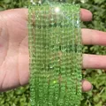 Detailed view of sparkling faceted lime green cube crystal glass beads for DIY jewelry - 1 Strand (Approx. 95 Pcs) / Green