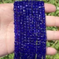 Detailed macro shot showing deep blue faceted cube crystal glass beads for DIY jewelry making - 1 Strand (Approx. 95 Pcs) / Dark Blue