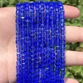 Detailed view of faceted square blue crystal glass beads for DIY jewelry making. - 1 Strand (Approx. 95 Pcs) / Sapphire Blue