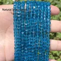 Close-up of faceted square blue crystal glass beads held in hand for jewelry DIY. - 1 Strand (Approx. 95 Pcs) / Blue