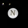 Close-up of a white mother of pearl round bead with a golden letter N for DIY jewelry. - Letter N (s2256) / 10 Pieces 8x5mm