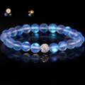 Mattblaues Mondstein-Perlenarmband mit funkelnder Kristall-Discokugel in der Mitte - 19cm 8mm Weiße Zirkonia-Perle Matt / Saphirblau