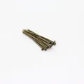 Detail view of bronze-finish metal T-head pins for handmade DIY jewelry crafting - 16mm / Antique Bronze