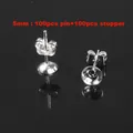 Close-up of 5mm silver earring pin trays and butterfly stoppers for DIY jewelry making. - 1 Pin + 1 Back / 5mm / Silver