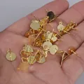 Close-up detail of gold plated earring studs with flat pad and loop for DIY jewelry making - Flat Base with Loop / 10 Pieces/Pack (6mm) / 18K Gold