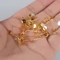 Close-up of 18K gold plated earring stud components held in hand for DIY jewelry making. - Flat Head (No Stamp) / 20 Pieces/Pack (4mm) / 18K Gold