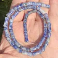 Close-up of 5x12mm blue and white natural stone bamboo joint beads for DIY jewelry - One Strand Approx 31 Pieces (5x12mm) / Blue Spot Jasper