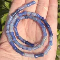 Close-up of 5x12mm blue bamboo-shaped natural stone beads for DIY jewelry making - One Strand Approx 31 Pieces (5x12mm) / Blue Aventurine