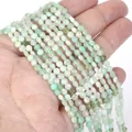 Detail view of 4mm faceted natural green stone disc beads for DIY jewelry making - 1 Strand Approx 98 Beads (4mm) / Prehnite 1