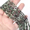 Close-up of 4mm faceted natural Ruby Zoisite spacer beads for DIY jewelry making. - 1 Strand Approx 98 Beads (4mm) / Ruby Zoisite