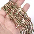 Close-up view of 4mm faceted Unakite natural stone beads for DIY jewelry making - 1 Strand Approx 98 Beads (4mm) / Unakite