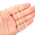 Macro shot of an 18K gold-plated jewelry chain with faceted clear acrylic beads - Acrylic Bead Chain (1 Meter) / Gold