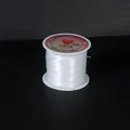 Close-up detail of a large spool of transparent non-elastic crystal string for DIY jewelry - Small Roll 0.2mm (approx. 80m) / Clear