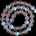 Close-up of frosted pink aura round beads with iridescent mermaid glow. - 10mm Approx 37pcs / Frosted Pink Flash Stone