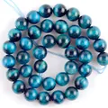 Close-up of natural royal blue tiger eye round loose beads for DIY jewelry making crafts - 4mm / Royal Blue Tiger Eye
