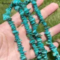 Close-up of turquoise shell chip beads showing irregular textures and vibrant colors. - Single String / Dark Green