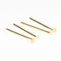 Detail macro view of four gold-tone metal T-pins for DIY jewelry and earring making - 16mm / KC Gold