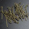 Detailed macro shot of antique bronze eye pins for DIY jewelry making and beading - 20mm (Price Per Gram) / Bronze