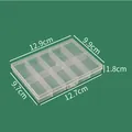 Transparent plastic storage box detail showing dimensions 12.9x9.9x1.8cm - 10 Grids 12.9x9.9x1.8cm