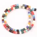 Macro view of 4x4mm colorful square lava stone beads for DIY jewelry making - 85 Pieces/Pack / Multicolor